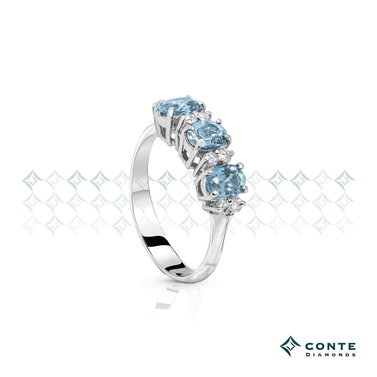 Anello trilogy con acquamarina