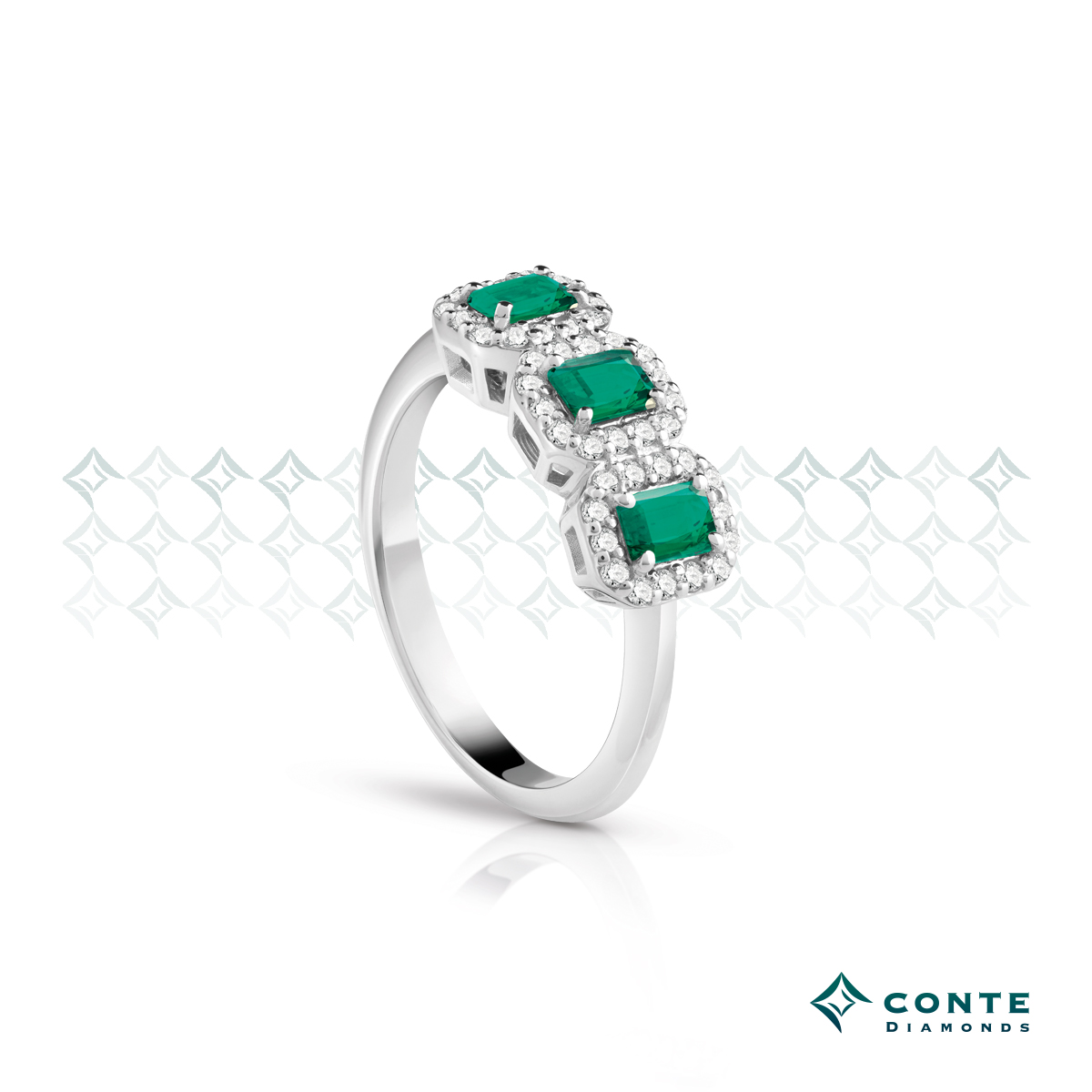 Anello trilogy con smeraldi ottagonali